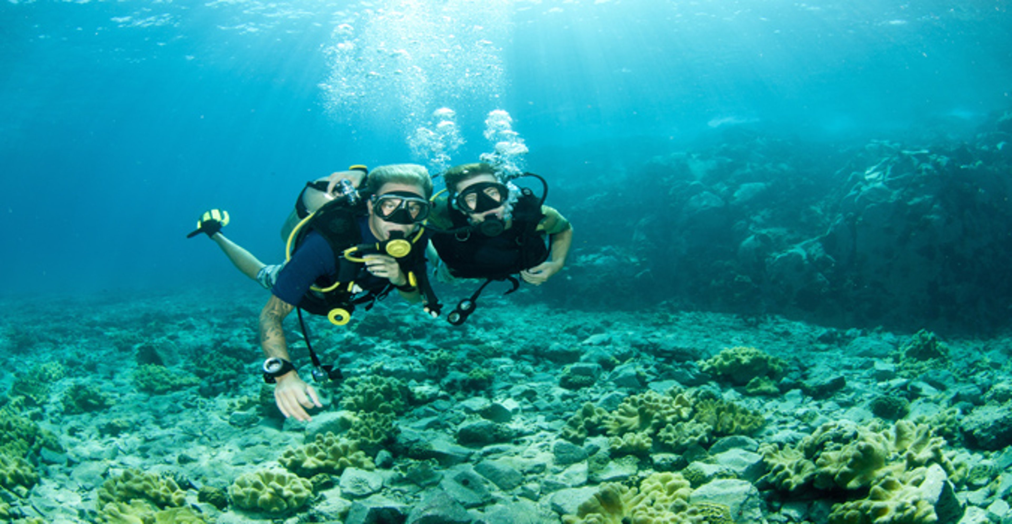 Man and Woman scubadiving in the Caribbean