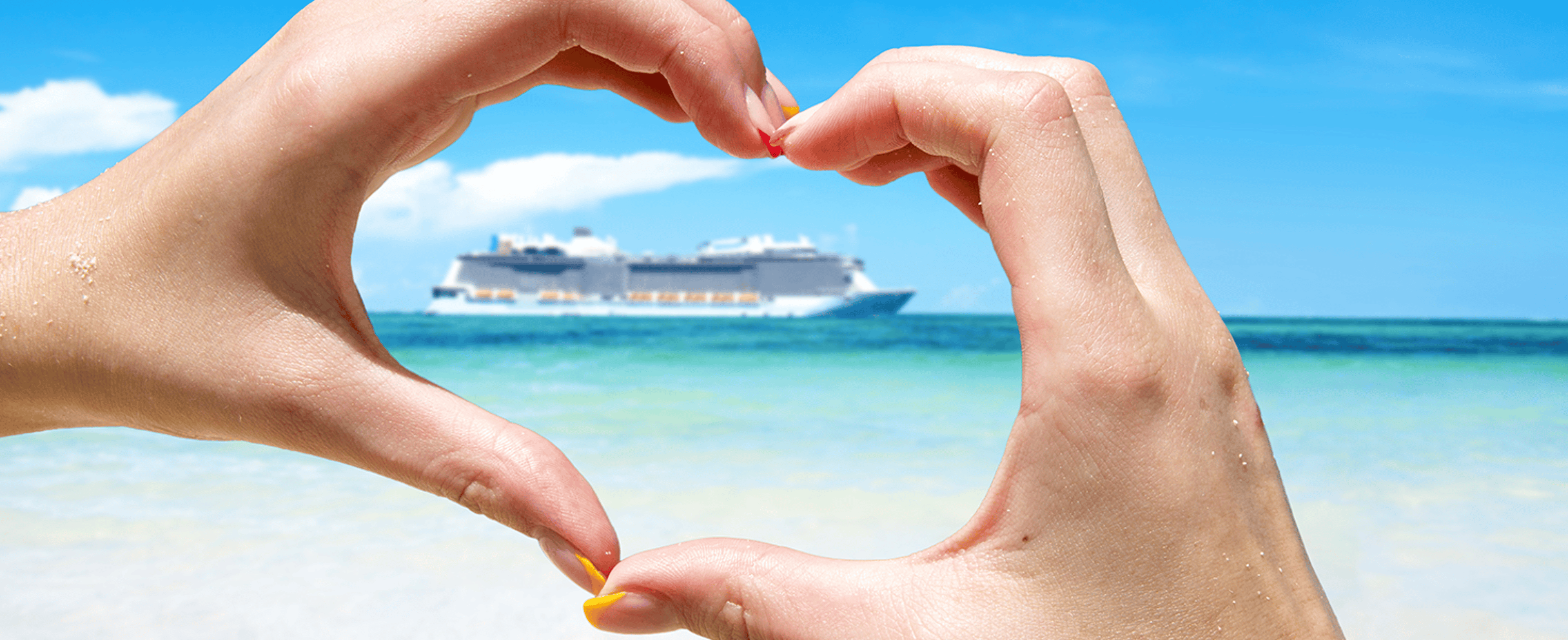 Cruise ship in background with heart hands framing it