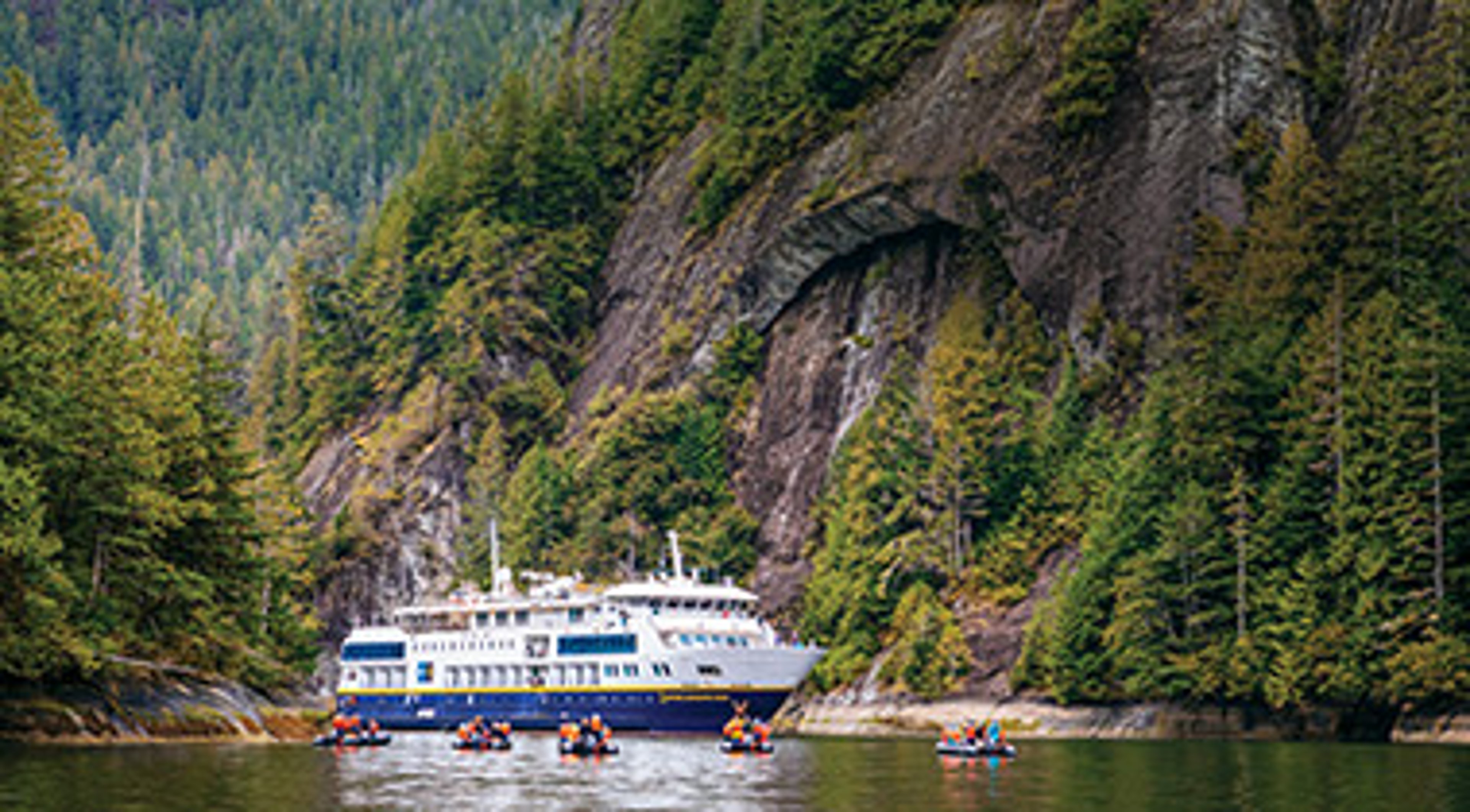 Lindblad ship sailing in a fjord