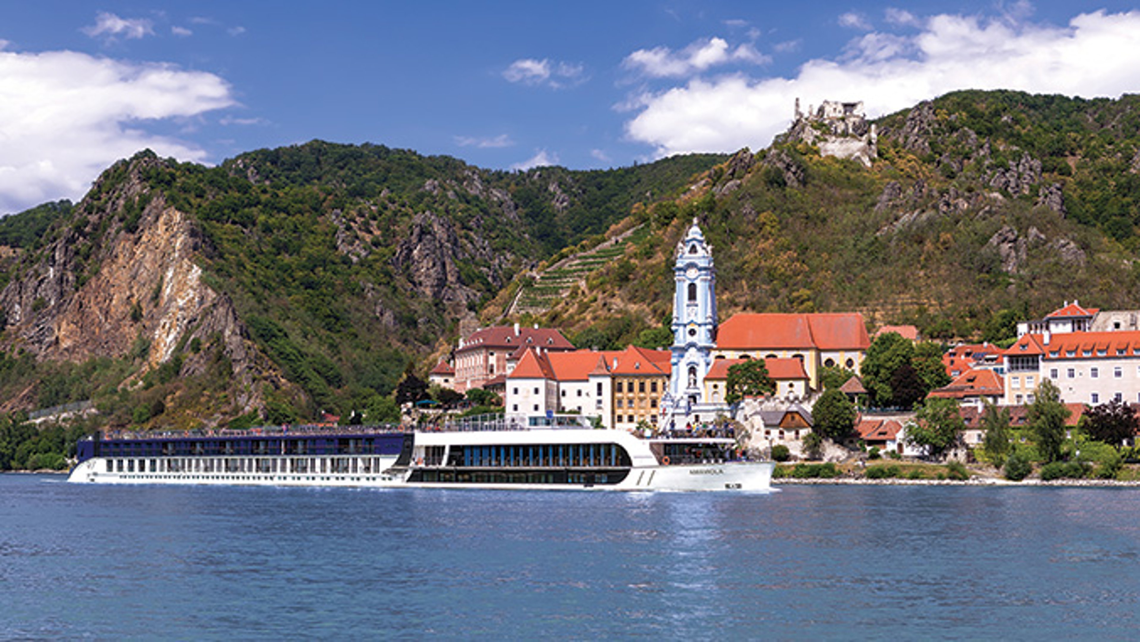 AmaViola ship cruises past Dürnstein, Austria.