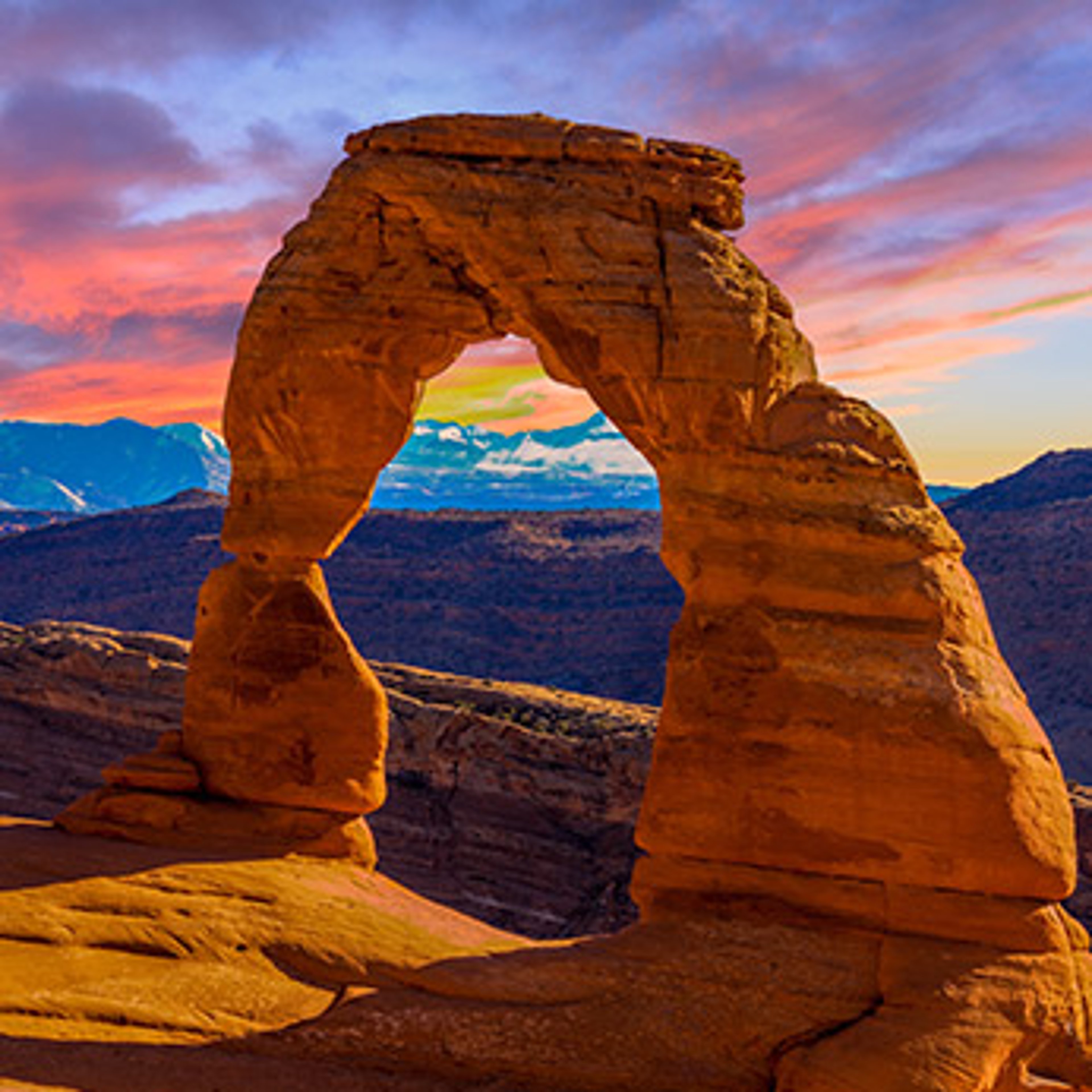 Delicate Arch at sunset, located in Arches National Park near Moab, Utah