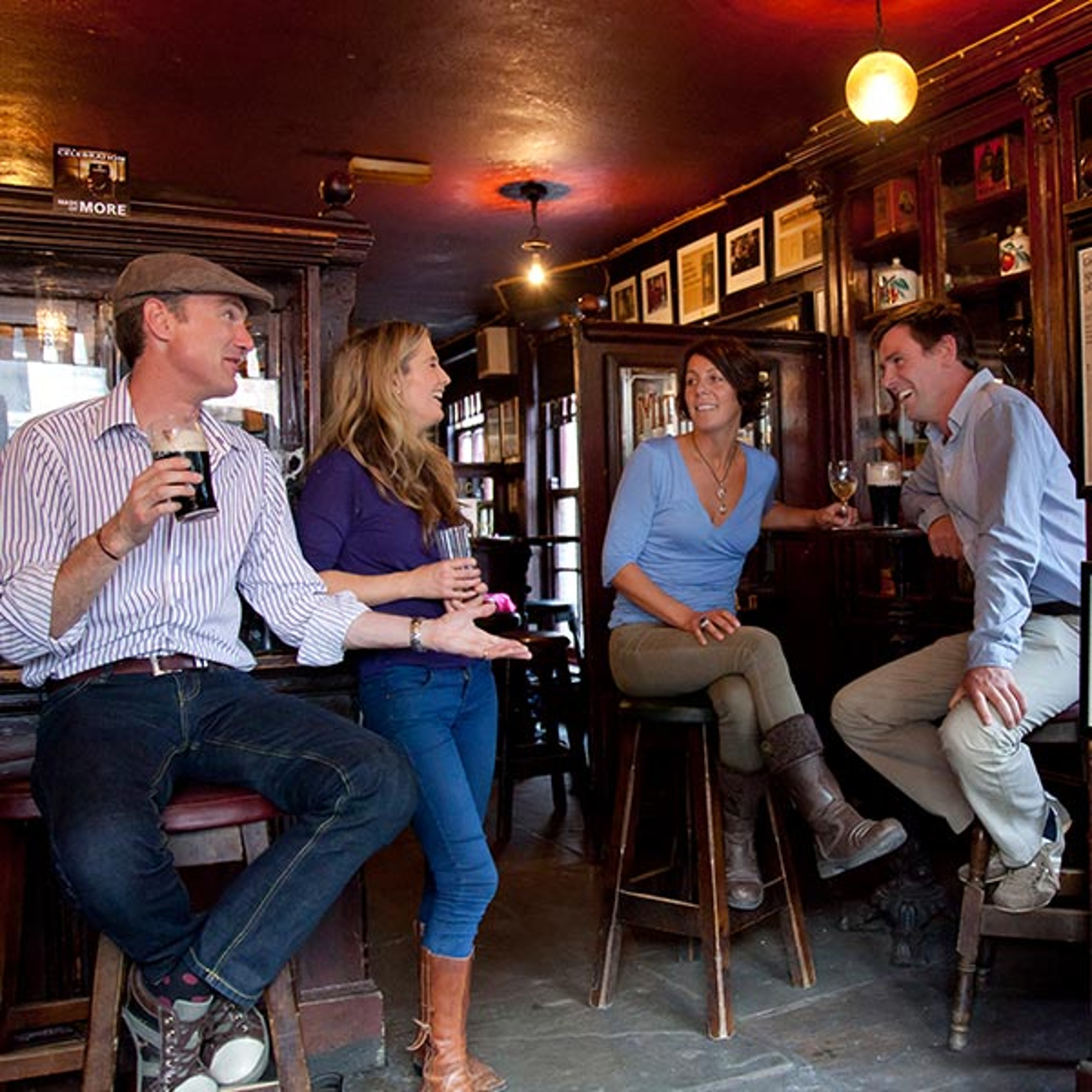 Group enjoying drinks in an Irish pub