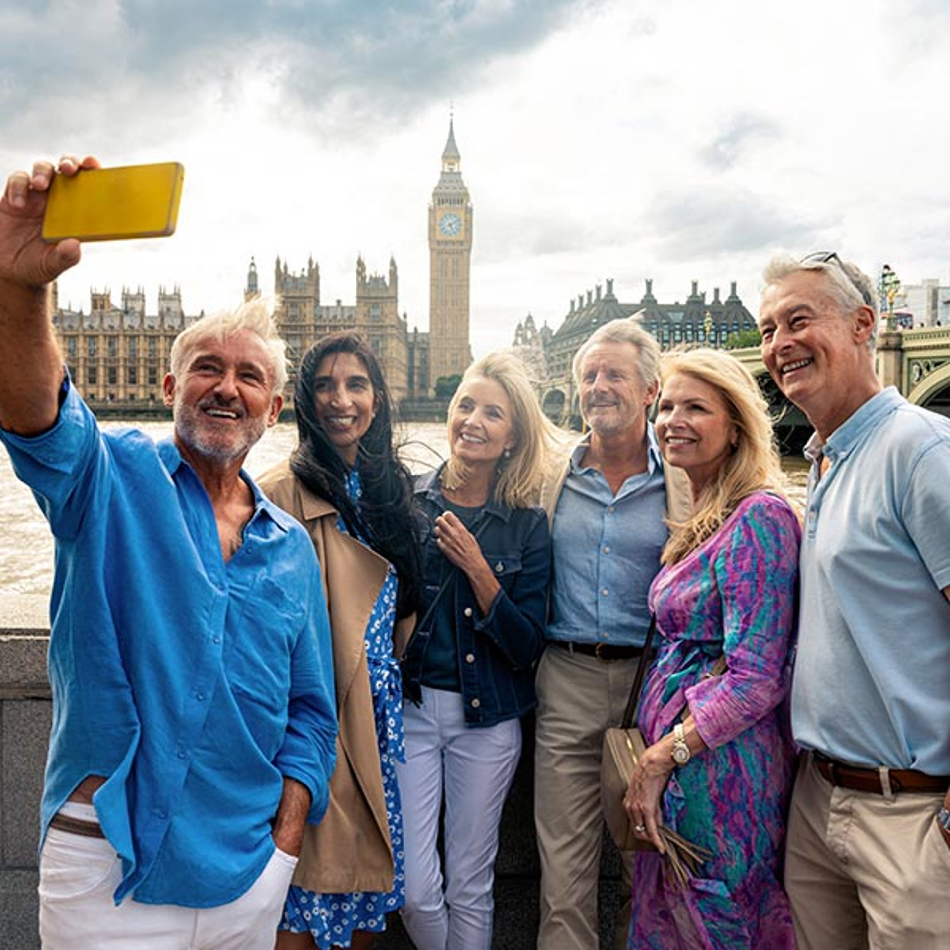 Group of travelers taking a selfie in London