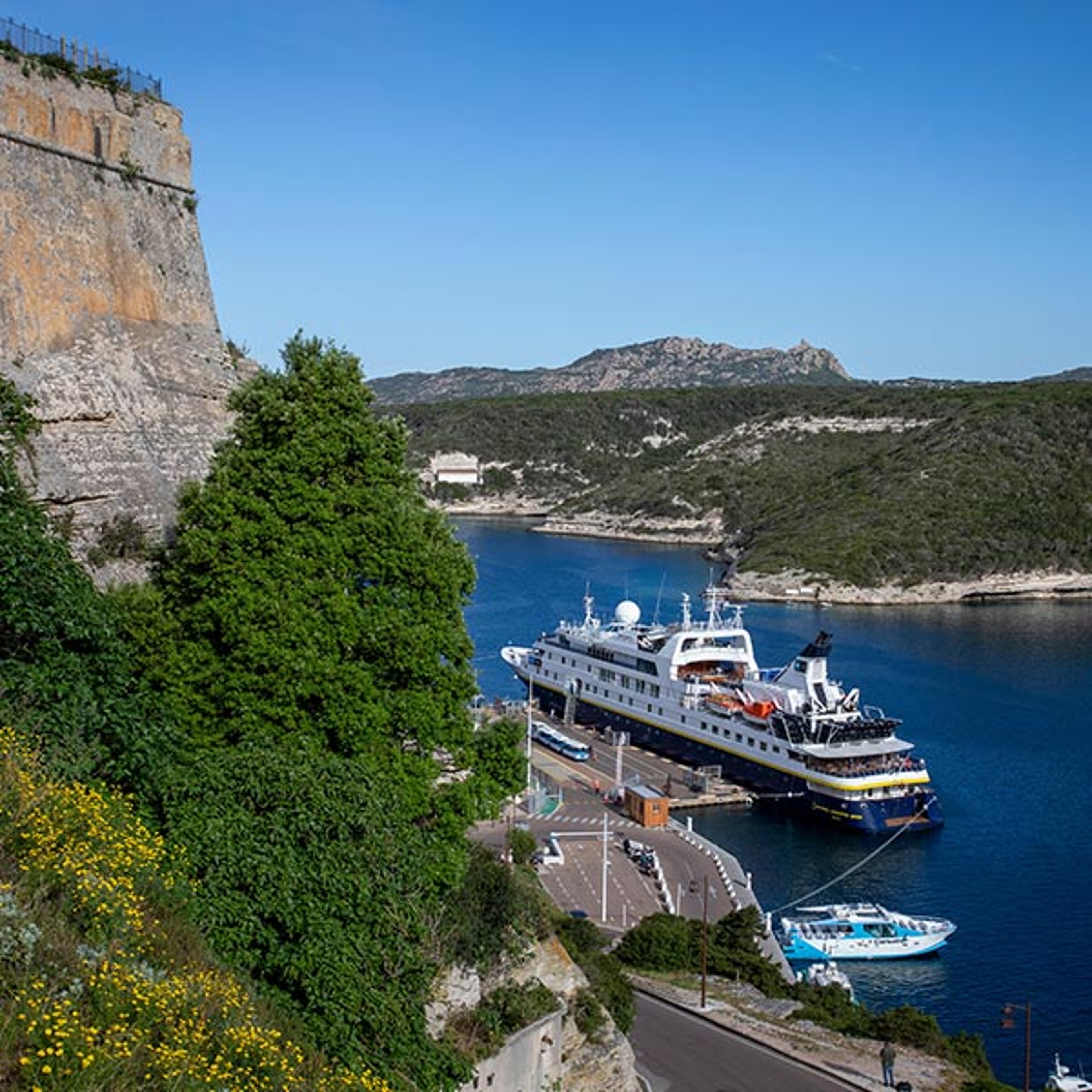 Lindblad ship cruising off the coast Corsica