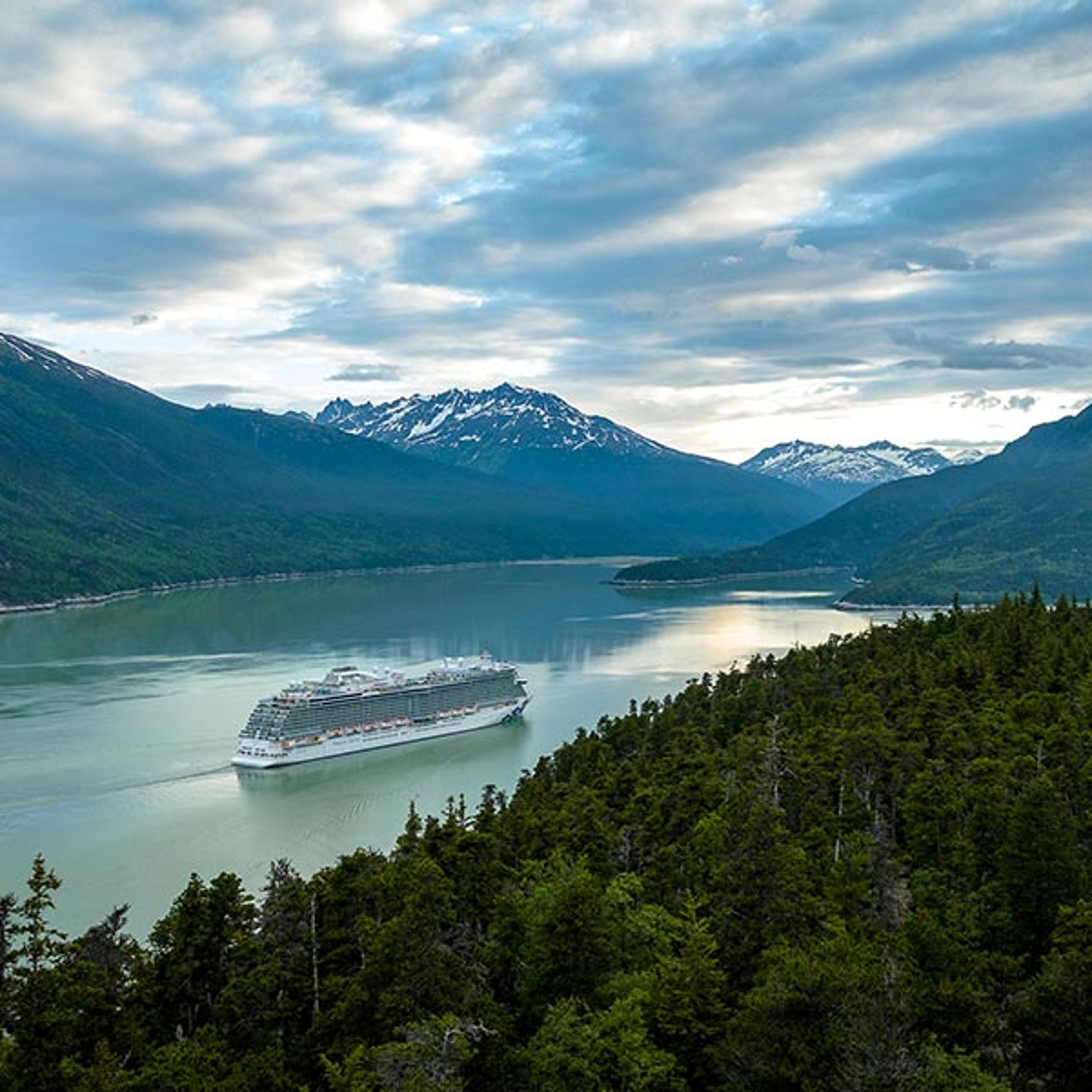 Princess Cruise ship sailing along the coast in Alaska