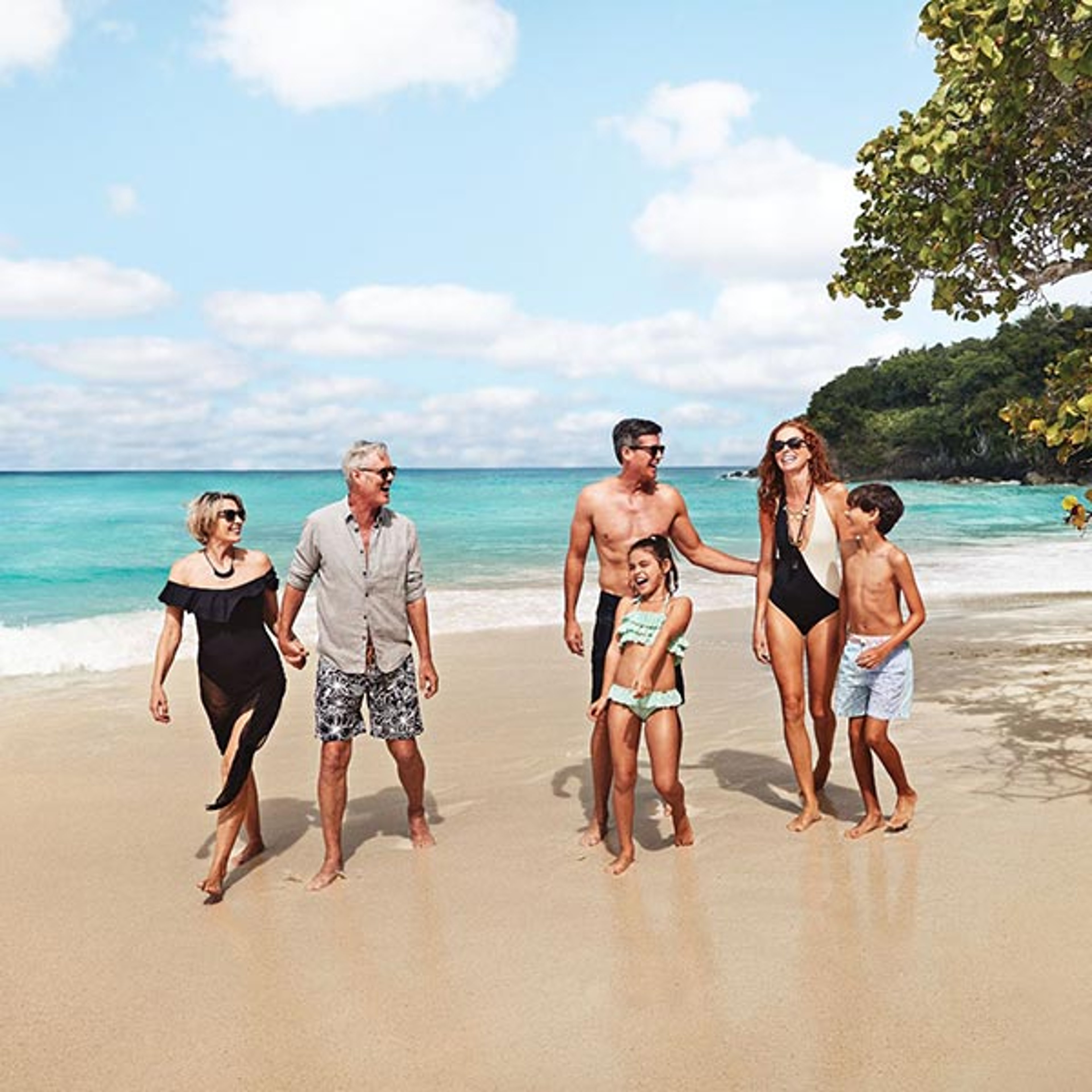 Family walking on a beach