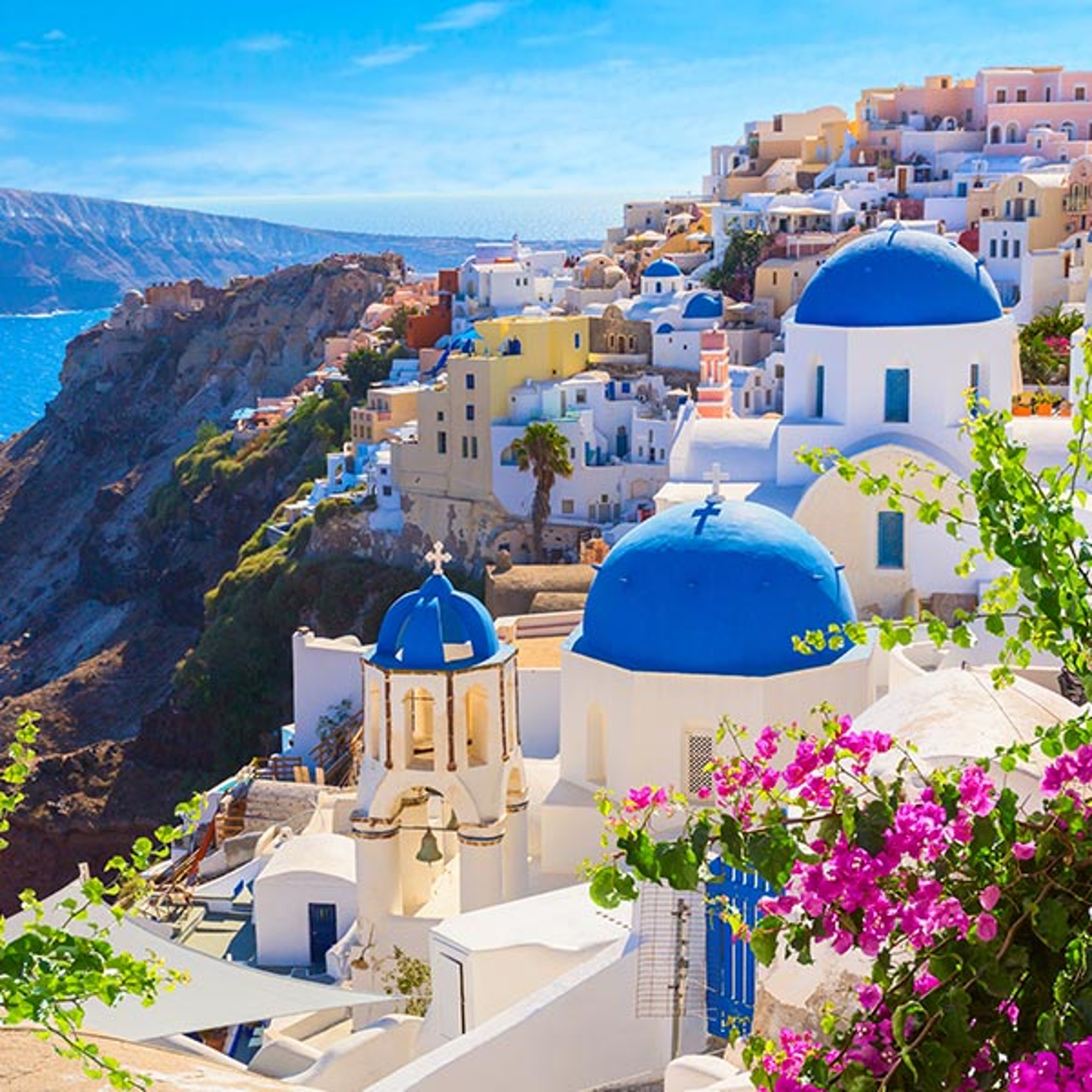 Scenic view of blue domed buildings in Santorini