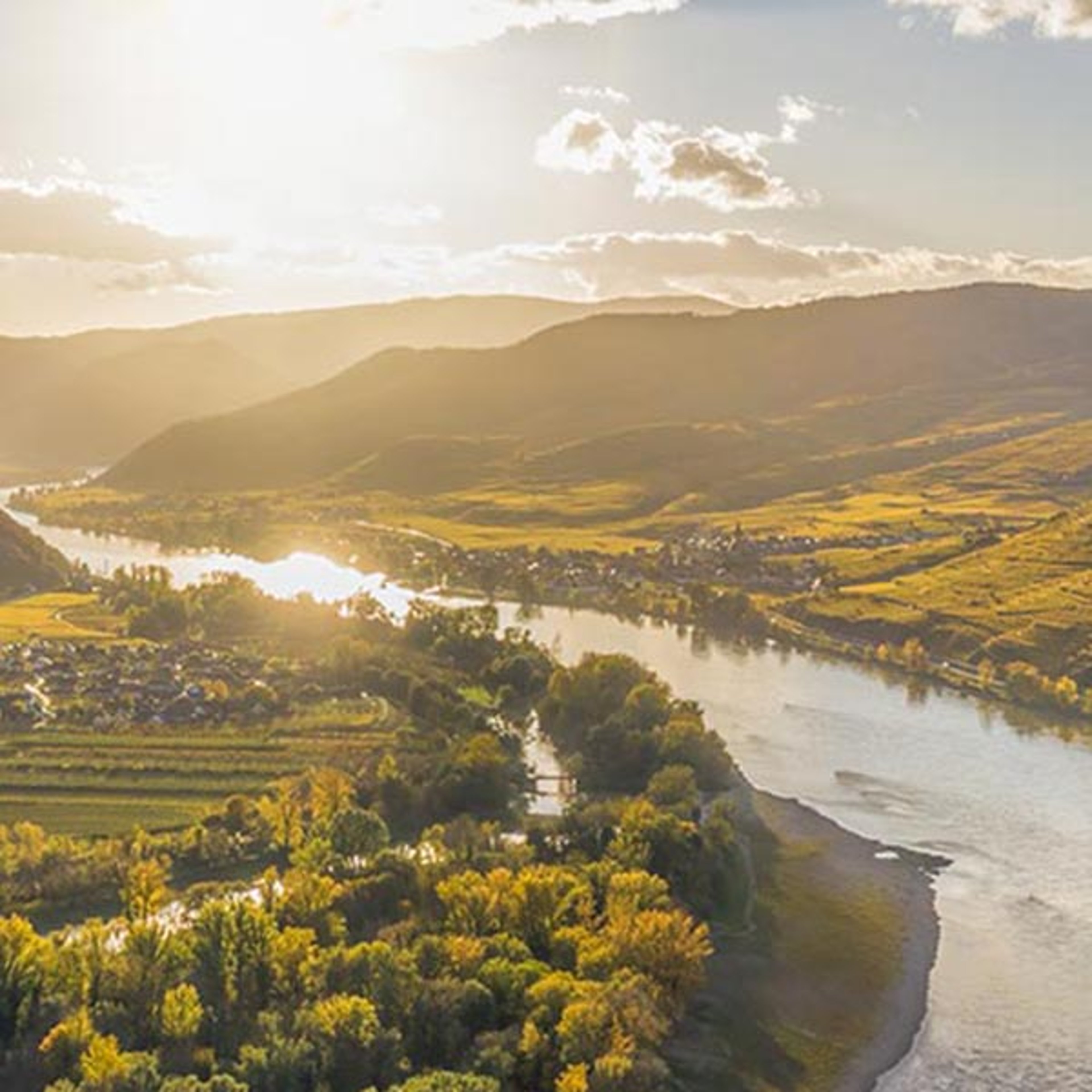 Danube River winding through a sunlit countryside