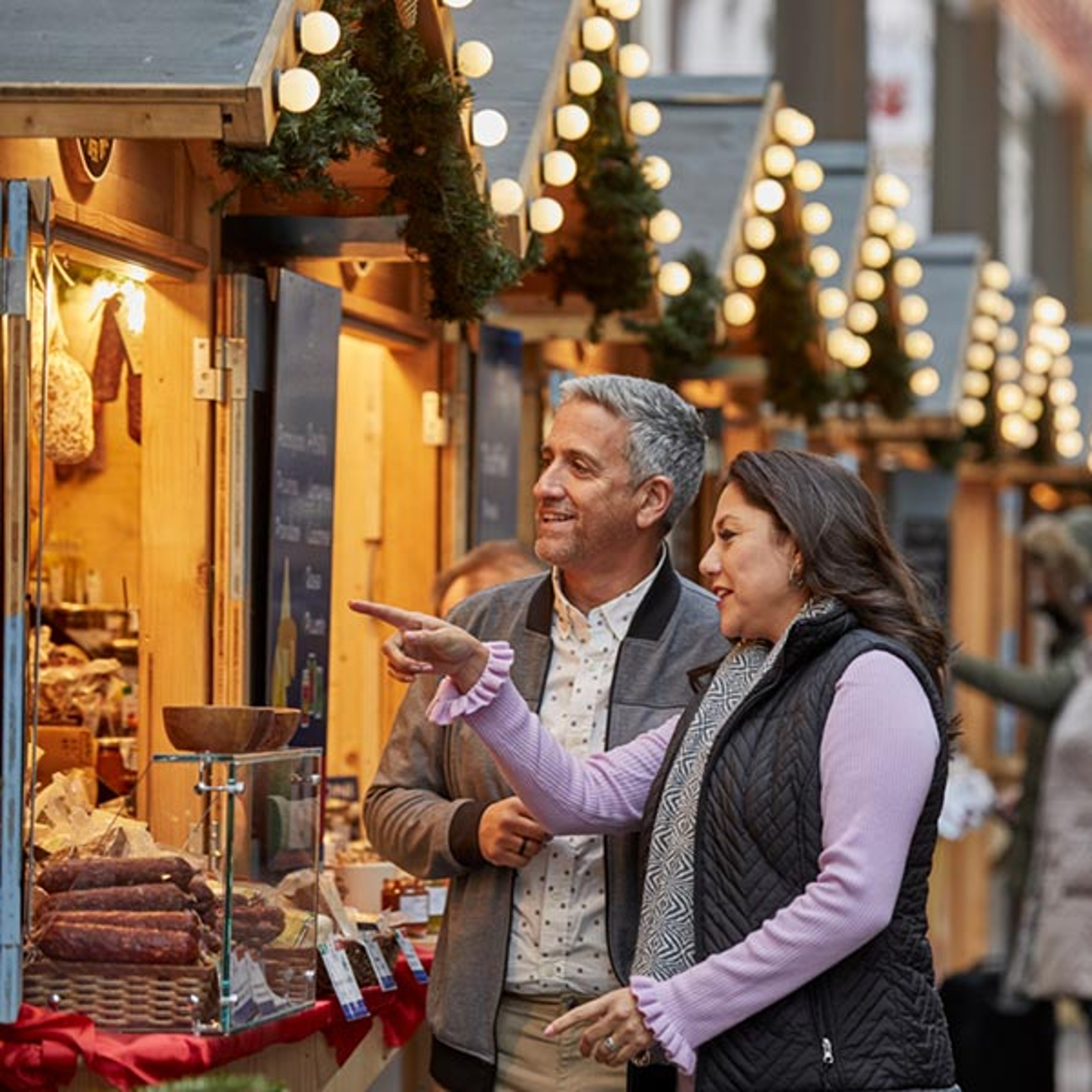 Couple at Holiday Market booth