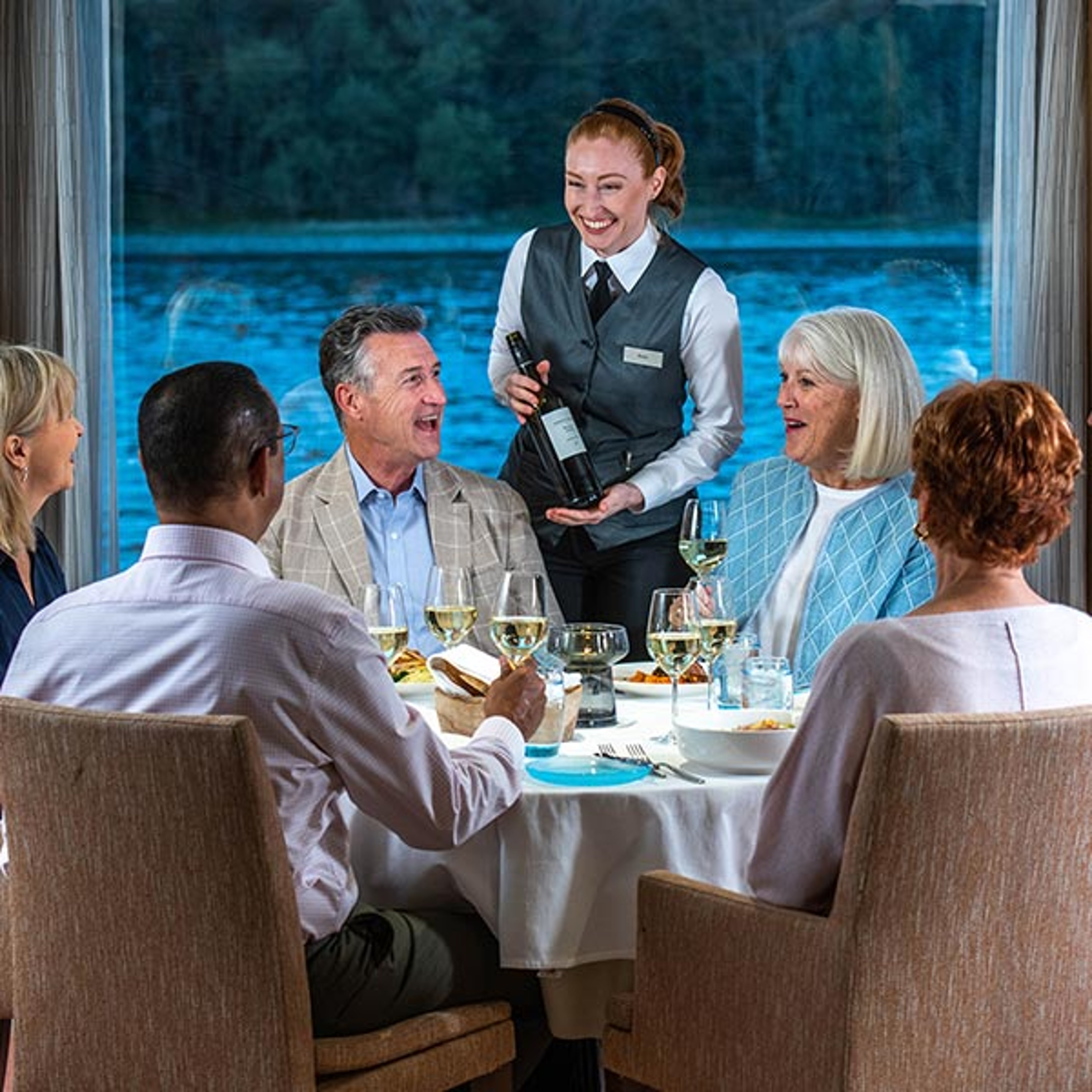 A group enjoying dinner during their Viking cruise
