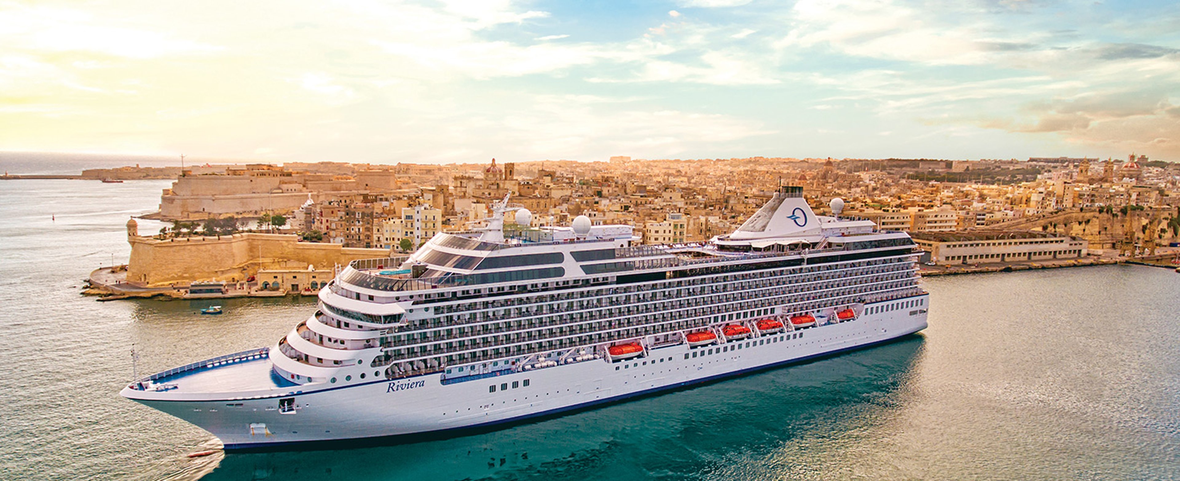 Oceania Riviera cruising off the Mediterranean coast