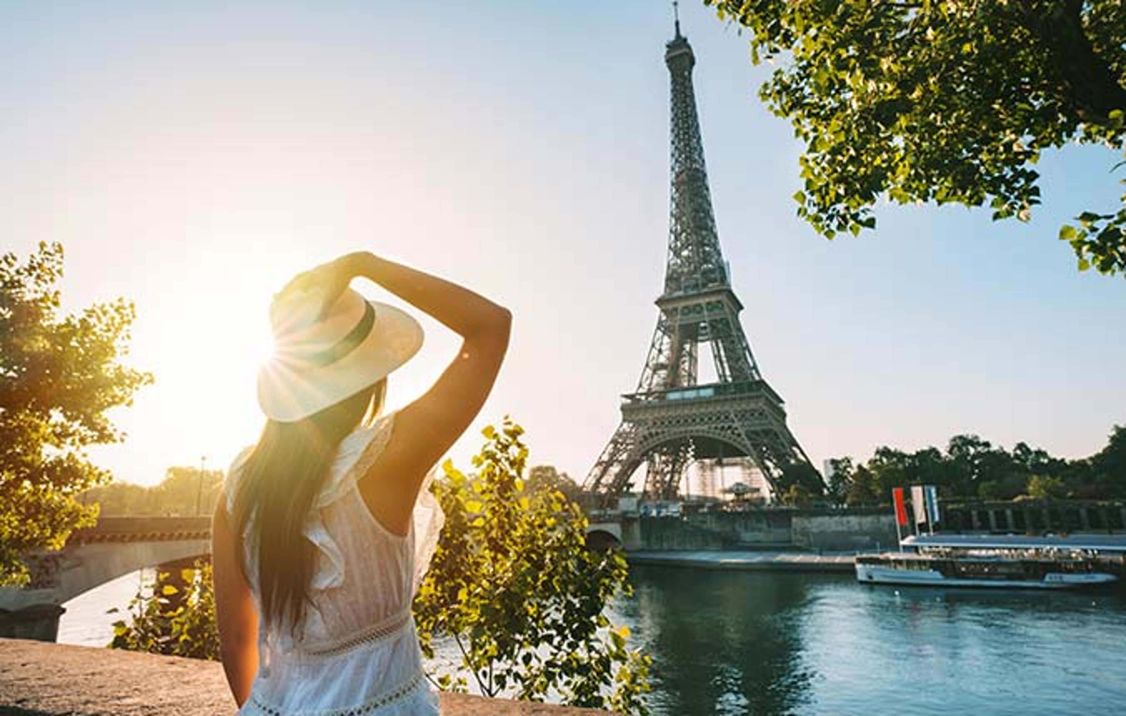 Traveler looking at Eiffel Tower in the distance