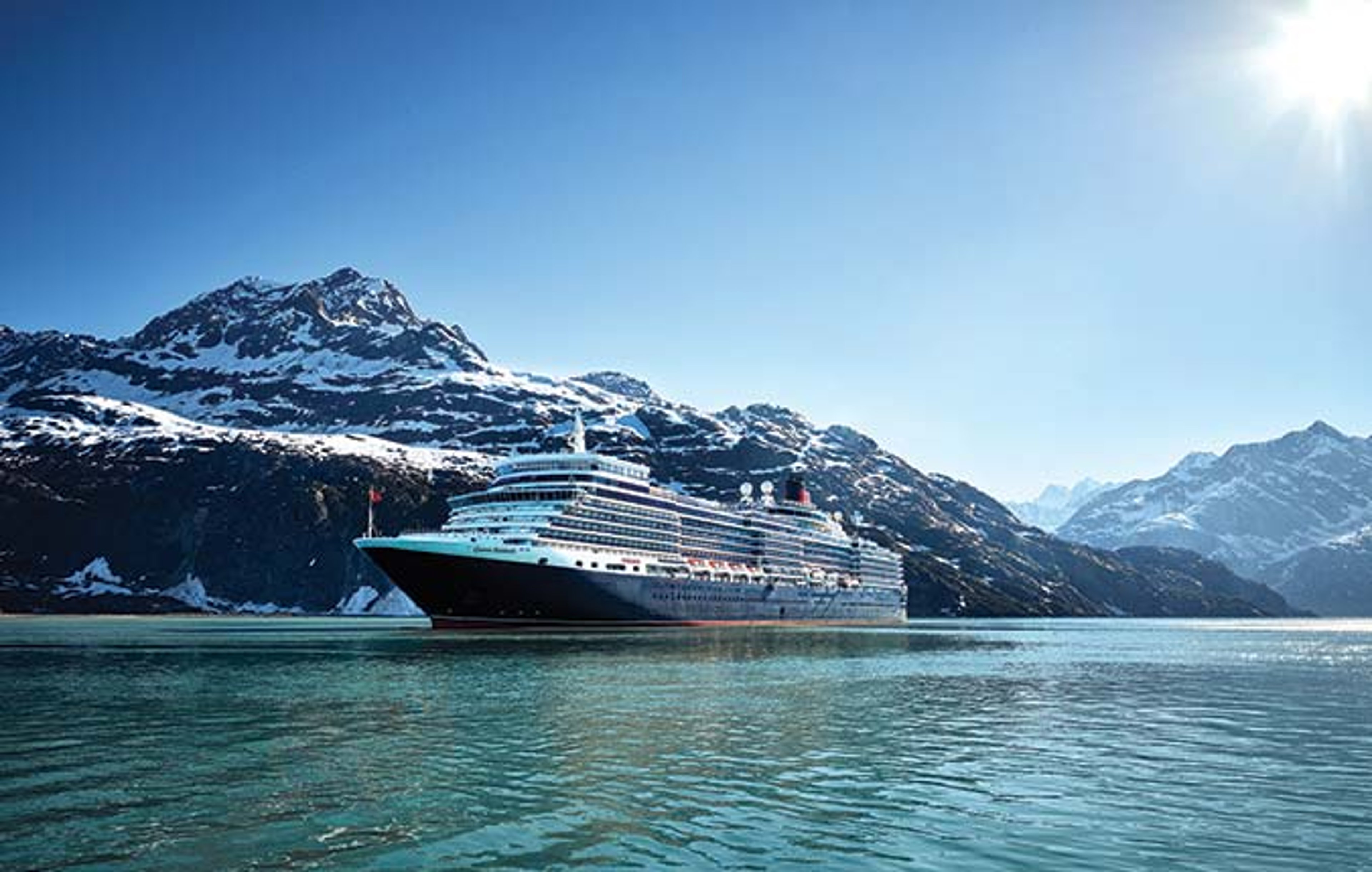 Cunard cruises ship and snowy mountains