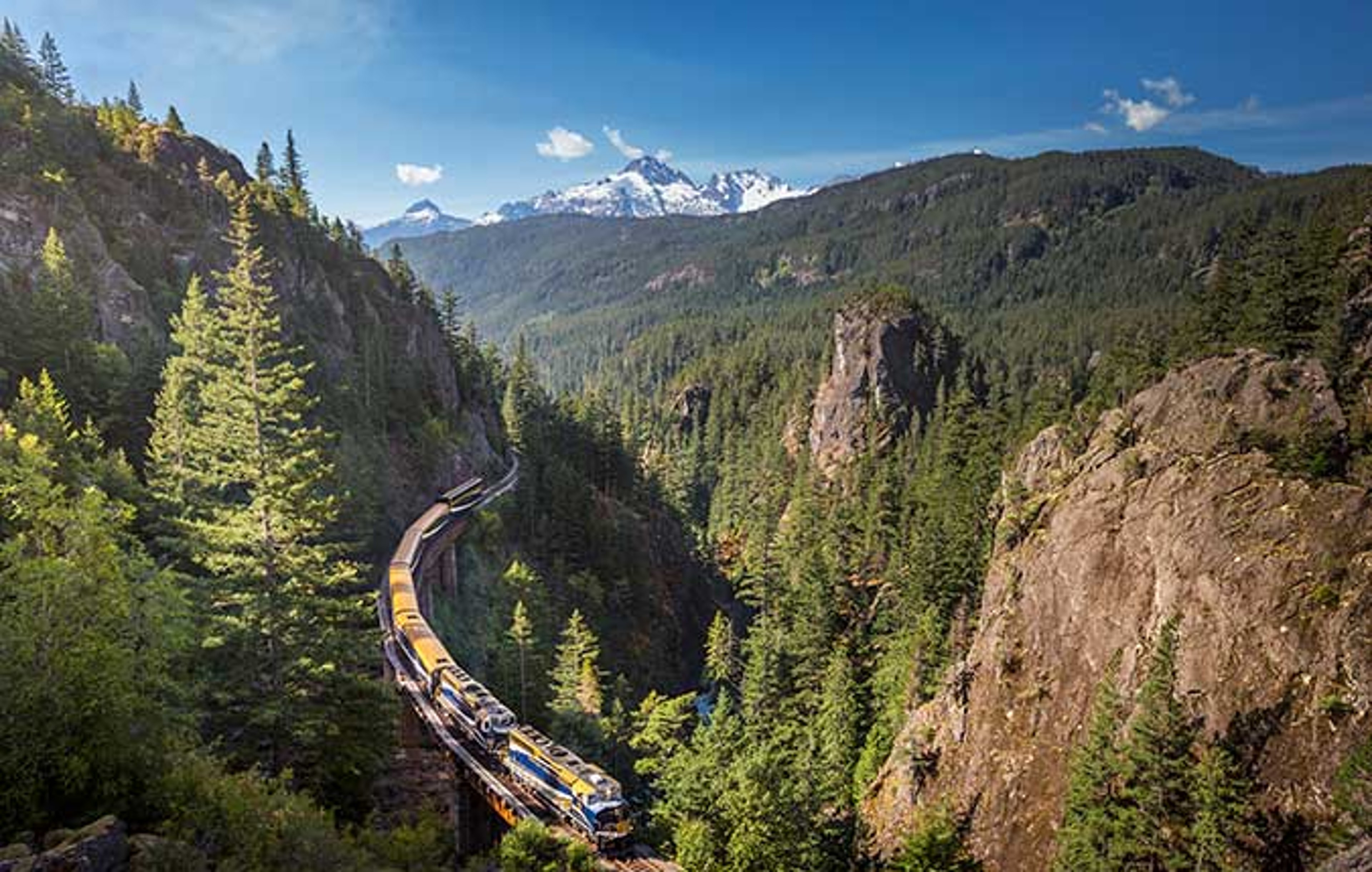 Rocky Mountaineer train winding through the mountains