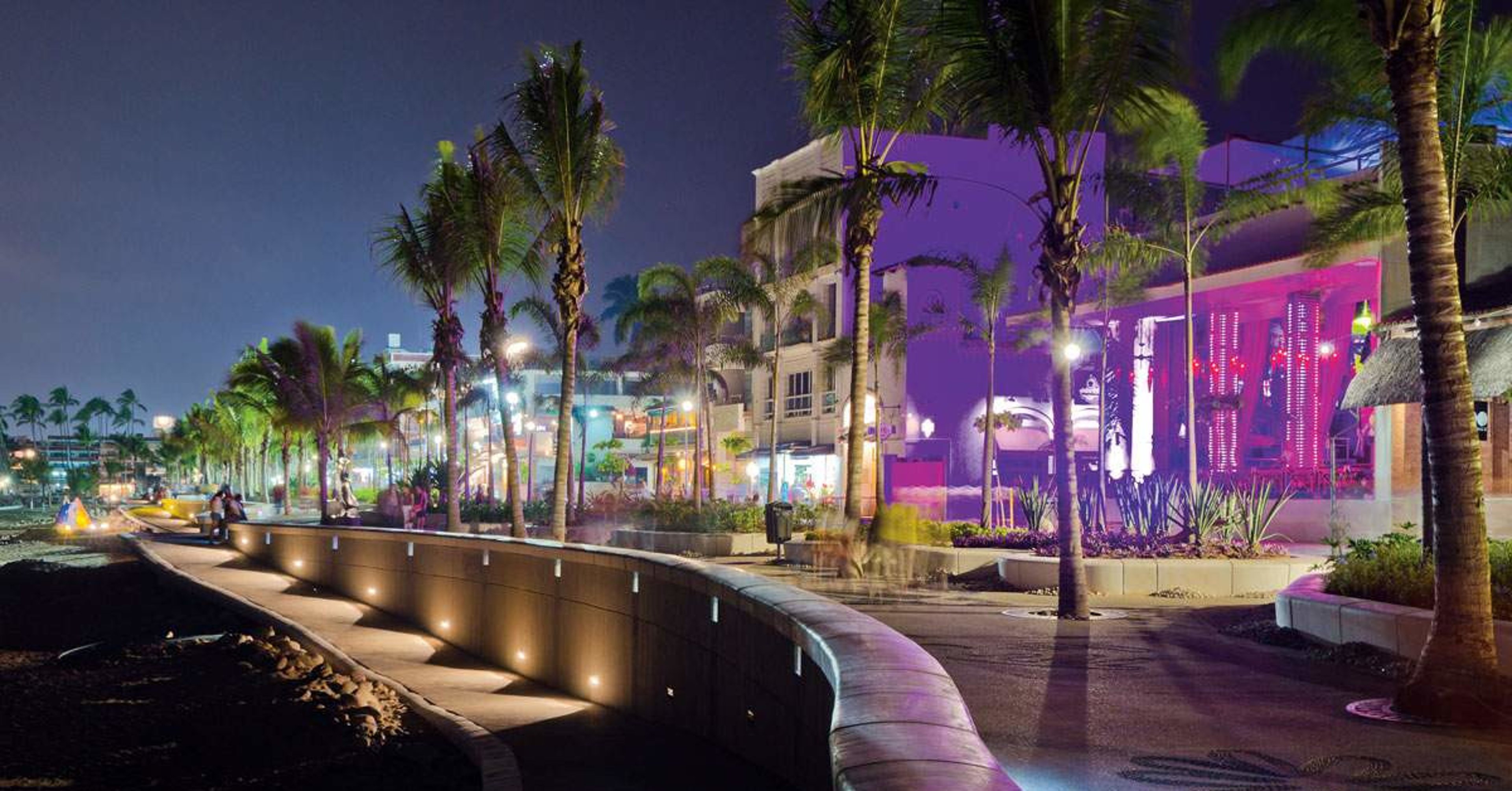 Promenade by the sea at night in Puerto Vallarta, Mexico