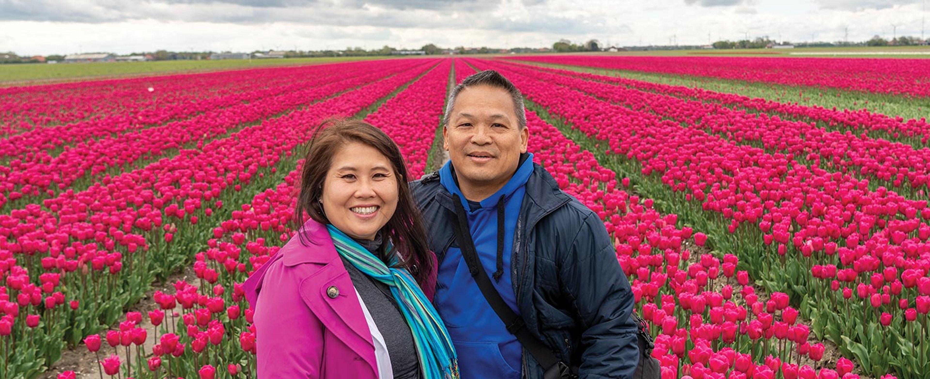 Couple in front of tulip fields