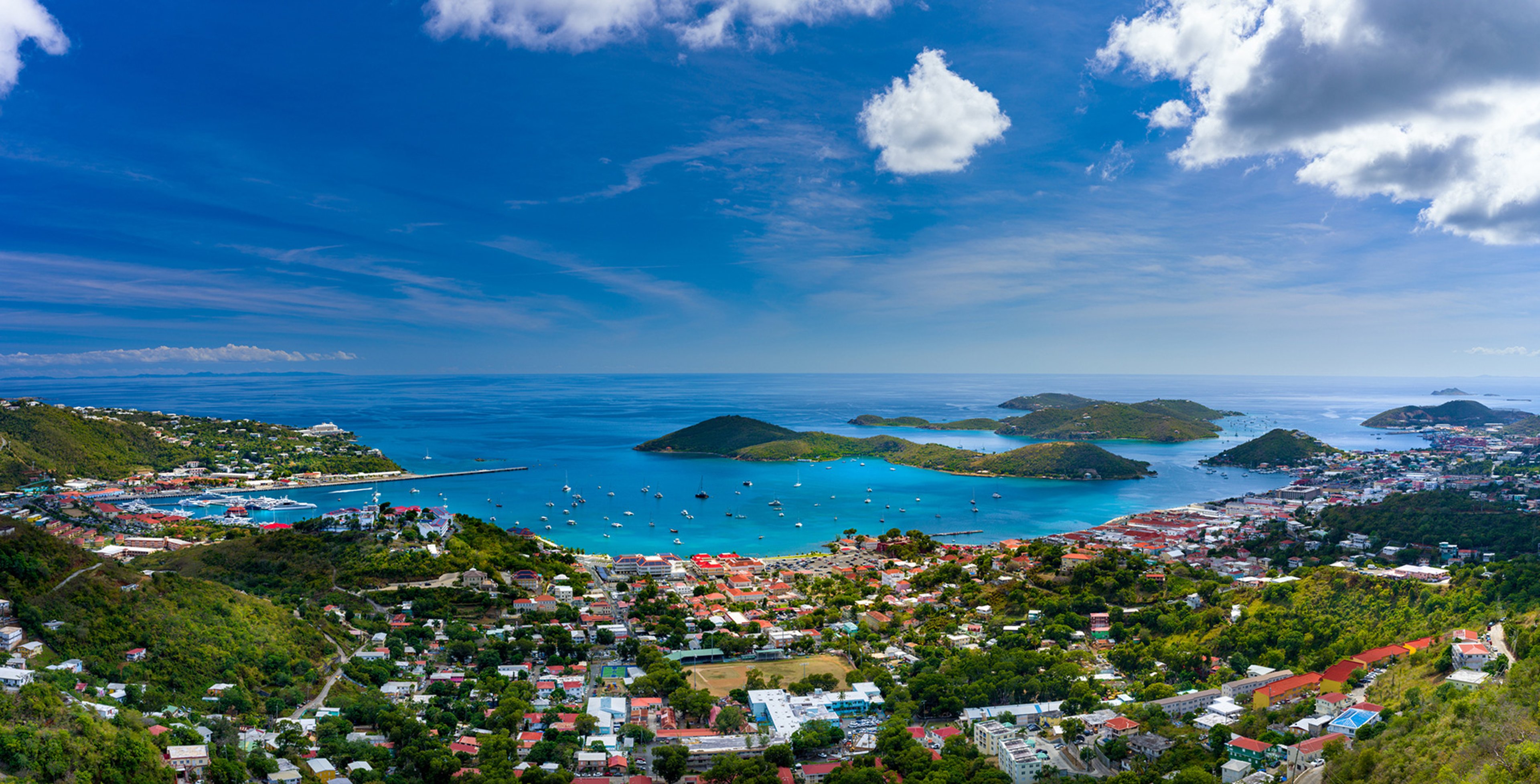 Aerial view of St. Thomas island with vacation resorts and ocean