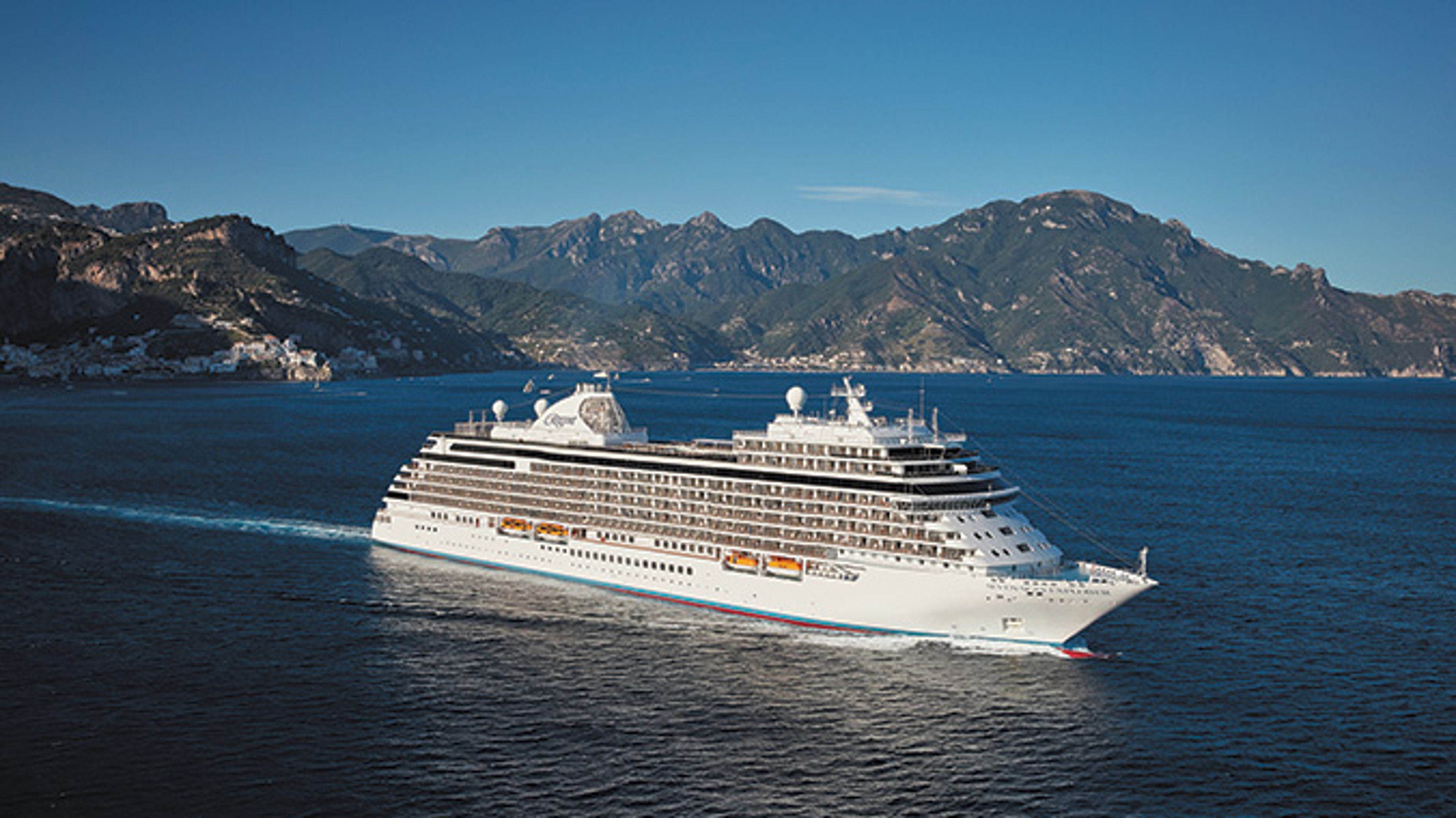 AAA Travel Set Sail Regent Seven Seas Cruises Seven Seas Explorer Regent Seven Seas cruise ship sailing on blue waters