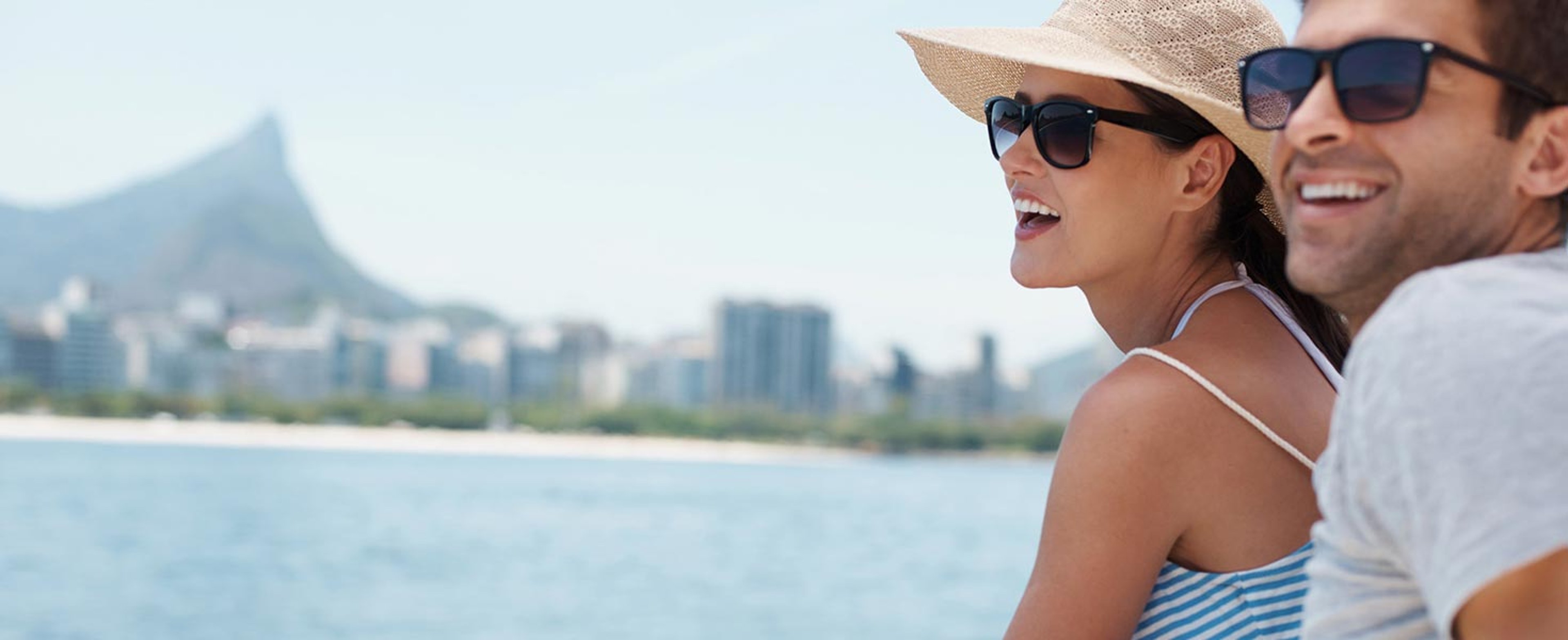 couple smiling on cruise deck