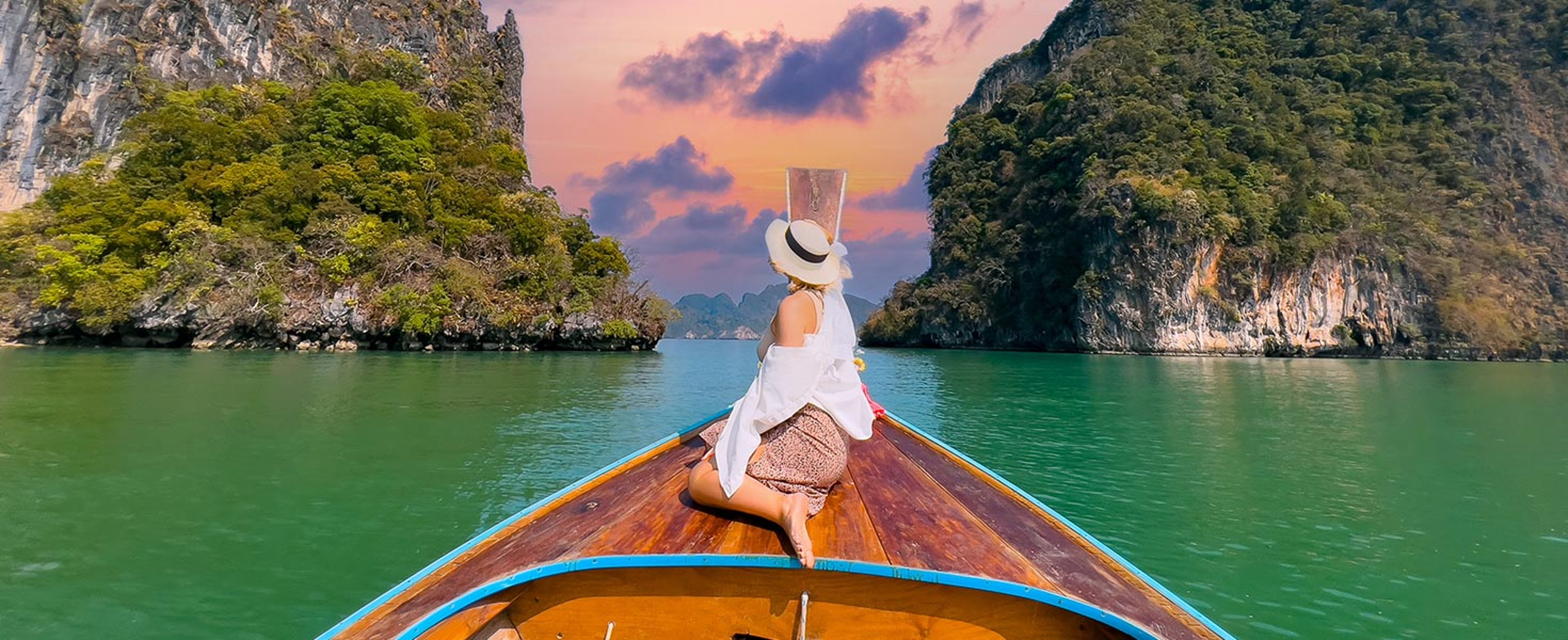 Woman on the front of a boat
