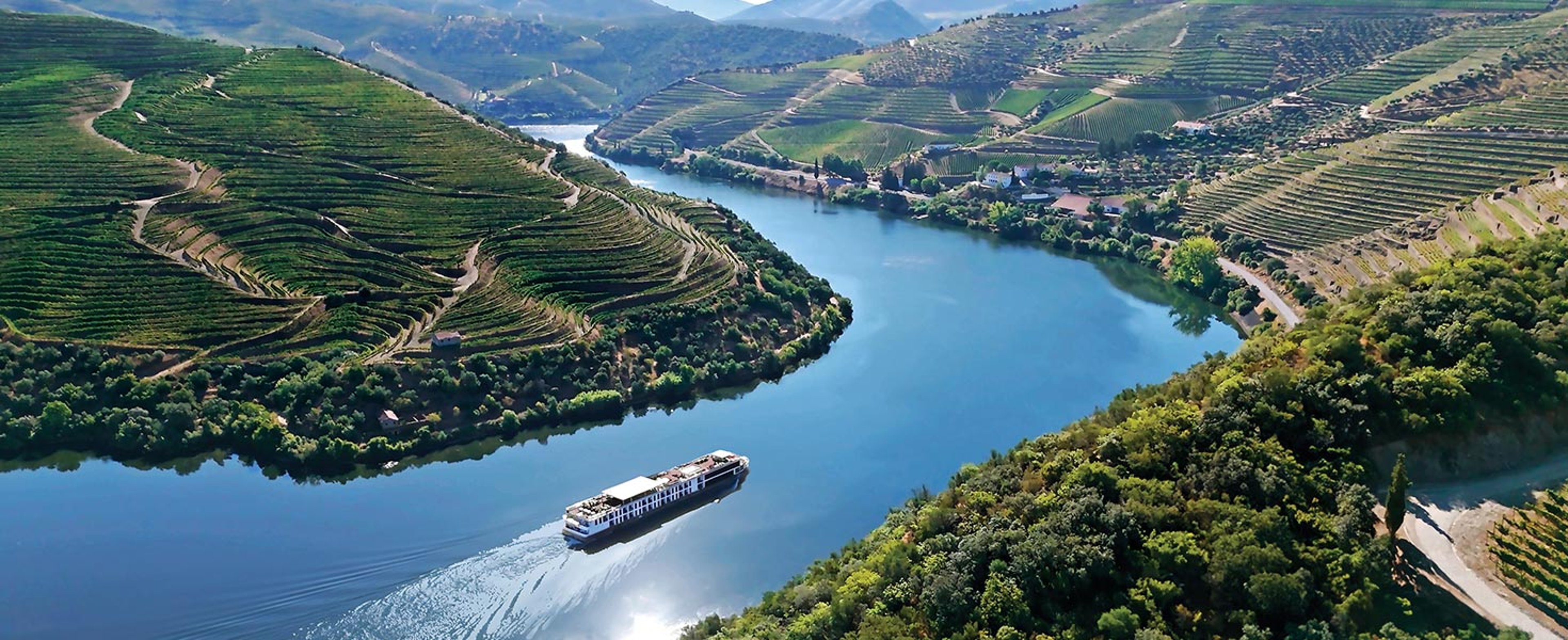 AmaWaterways ship sailing through Europe river valley