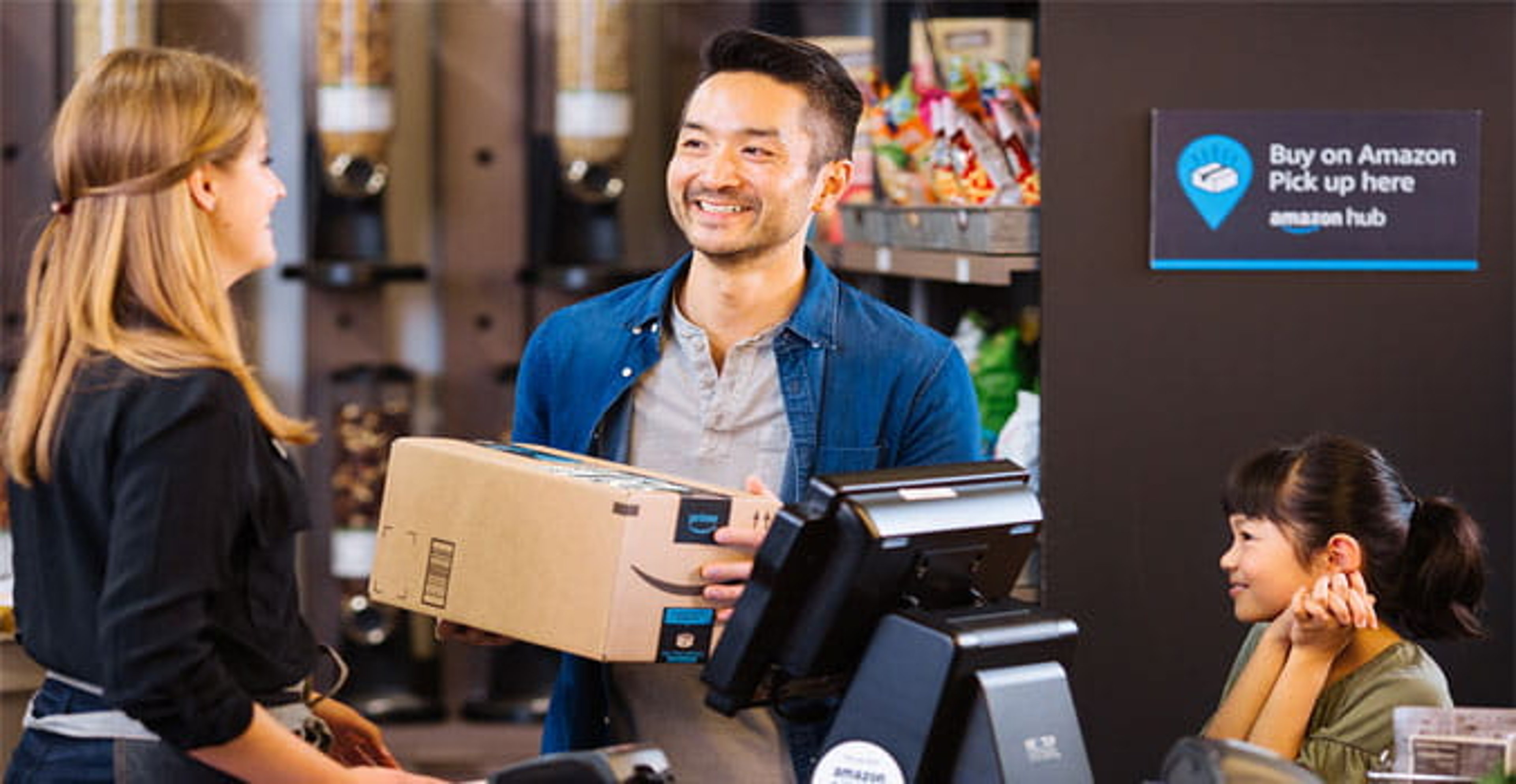 Customer picking up Amazon package at Amazon pickup location