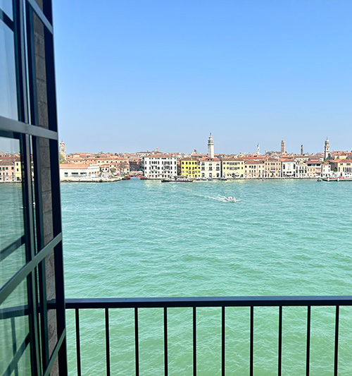 View of bay and clear blue waters in Venice, Italy from Hilton hotel balcony