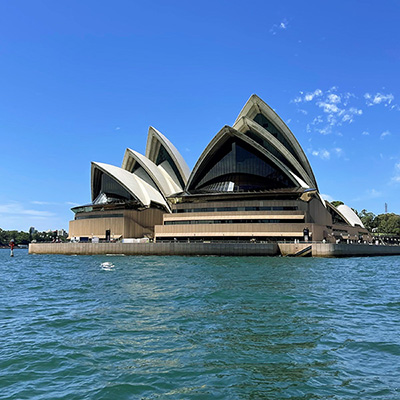 Daytime view of Sydney Opera House over the waters of Port Jackson, Sydney Harbour in Australia