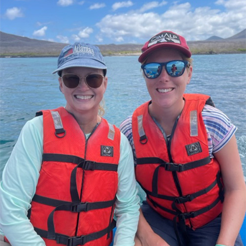 Tourist in wetsuits after a snorkeling adventure in the Galapagos