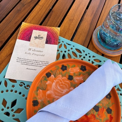 Dinner with invitation at Ritz-Carlton Zadún place setting on wooden table