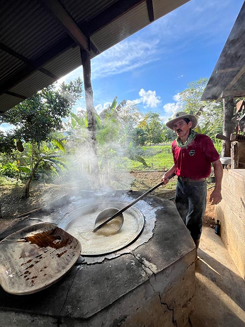 man cooking traditional Costa Rican food
