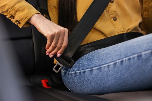 Seat belt being fastened