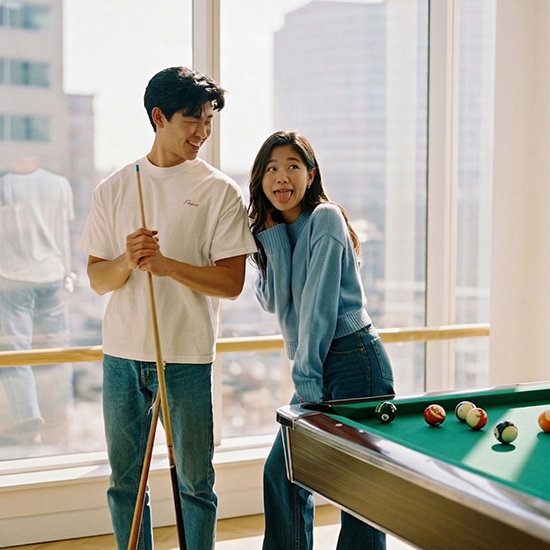 Couple playing pool