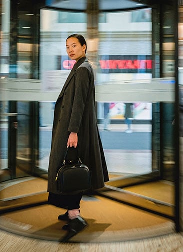 Girl in revolving door