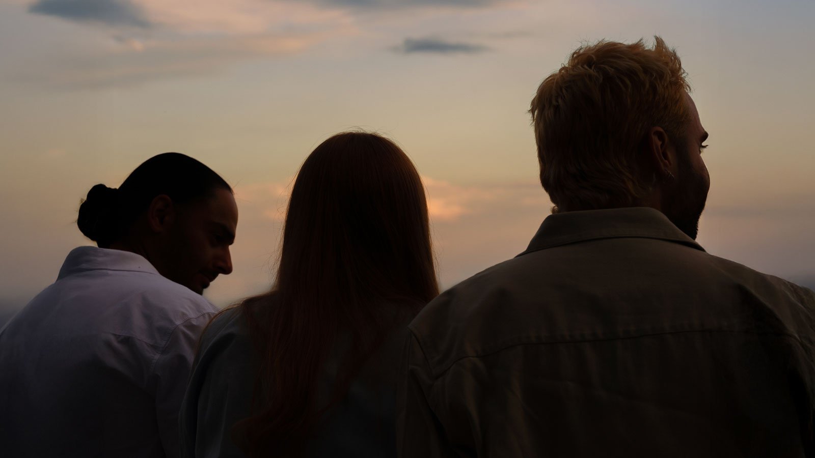 Three friends at sunset