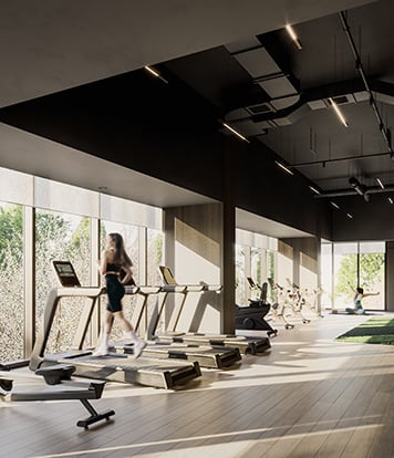 People running on treadmills at the gym