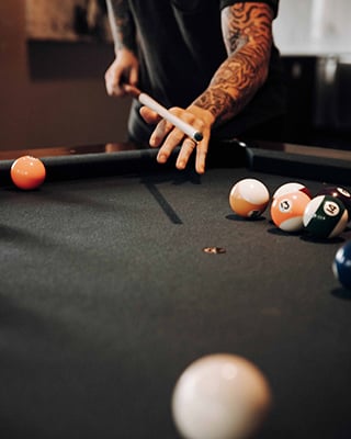 Pool table and games in the BLUESKY Chinatown residents' lounge