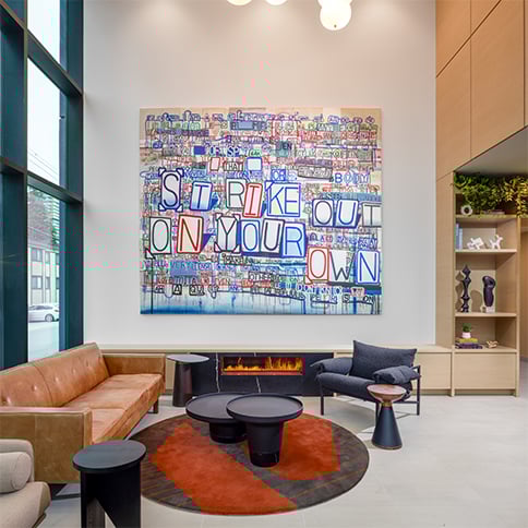 Building lobby with colourful artwork and furniture