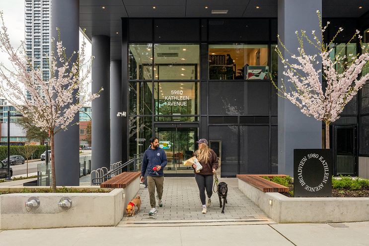 People walking in front of Broadview by Bosa Properties