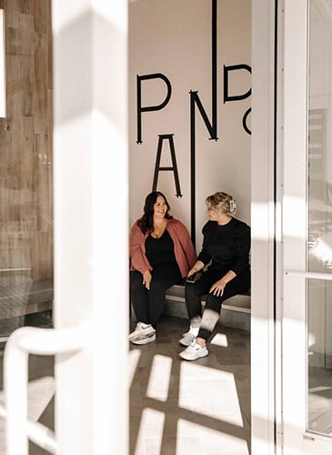 Residents gather at the entryway of Pandora by Bosa Properties