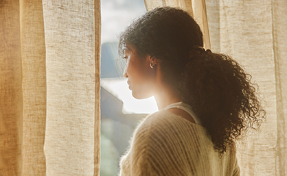 Woman looking out the window