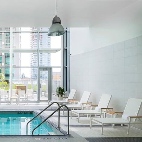 Inside pool with sunbeds