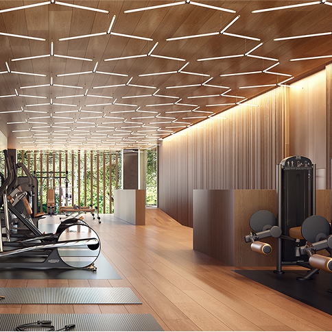 A gym with bright overhead lighting and wood detailing