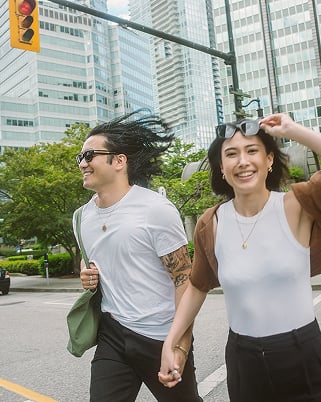 Couple walking and laughing