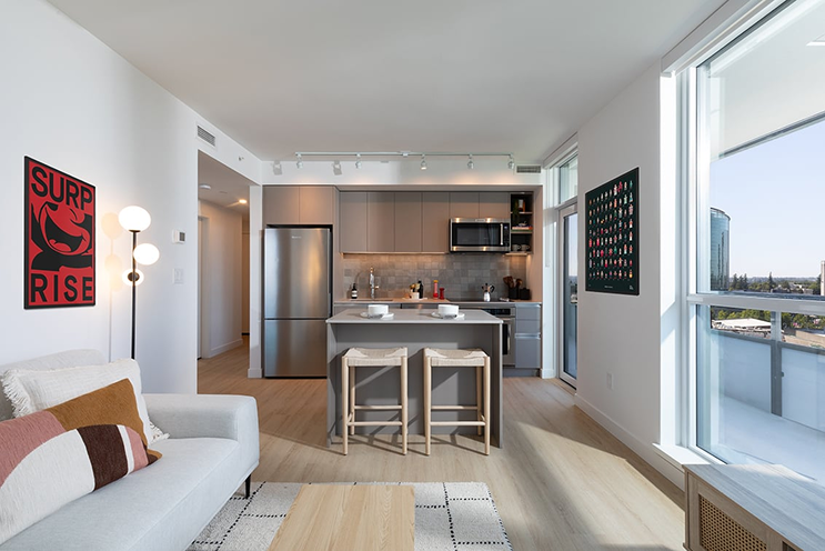 A living room in a light colour scheme