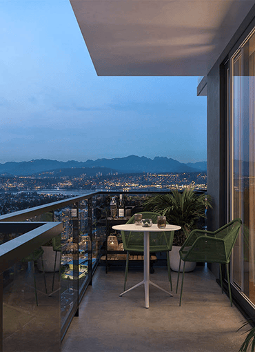 Twilight balcony with views of the mountains.