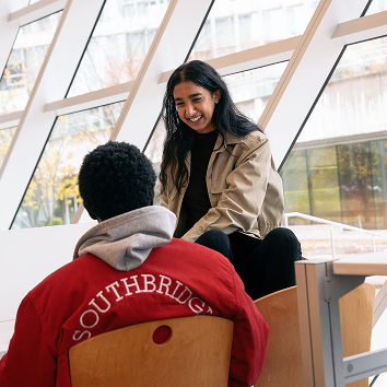 Girl and boy at library