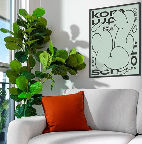 Couch with orange pillow