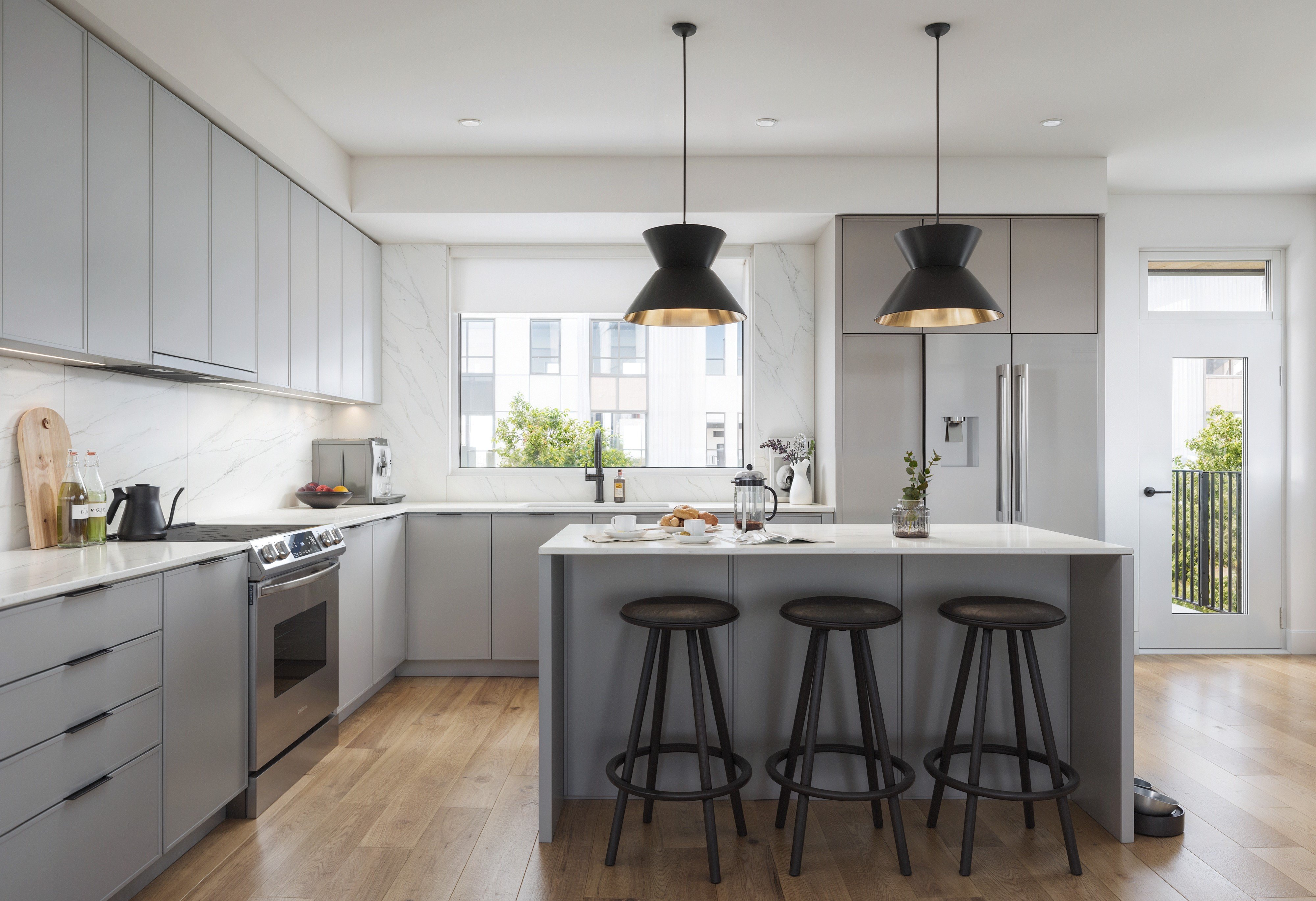 Kitchen in a light gray scheme in Squamish's SEAandSKY community