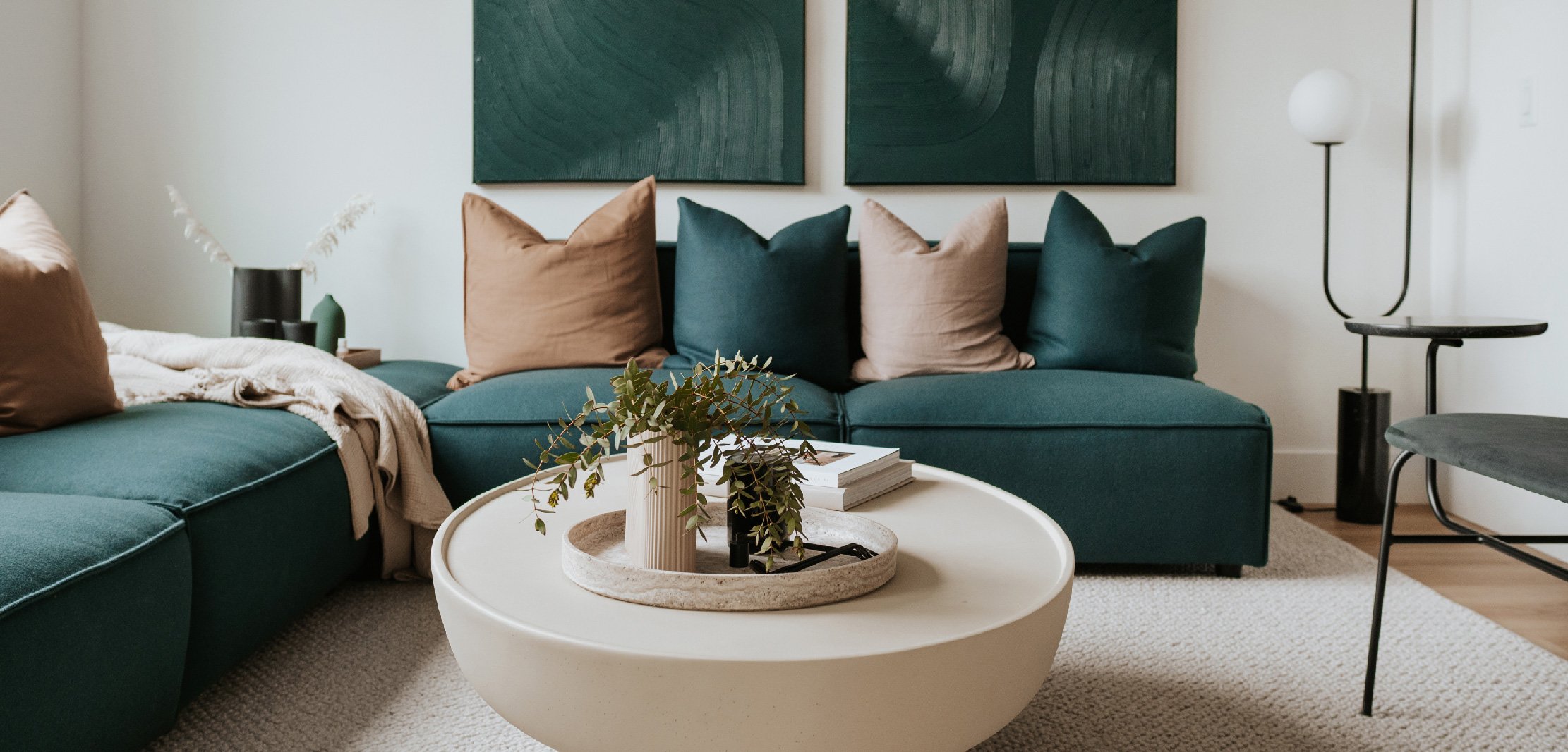 Green couch with pillows in living room
